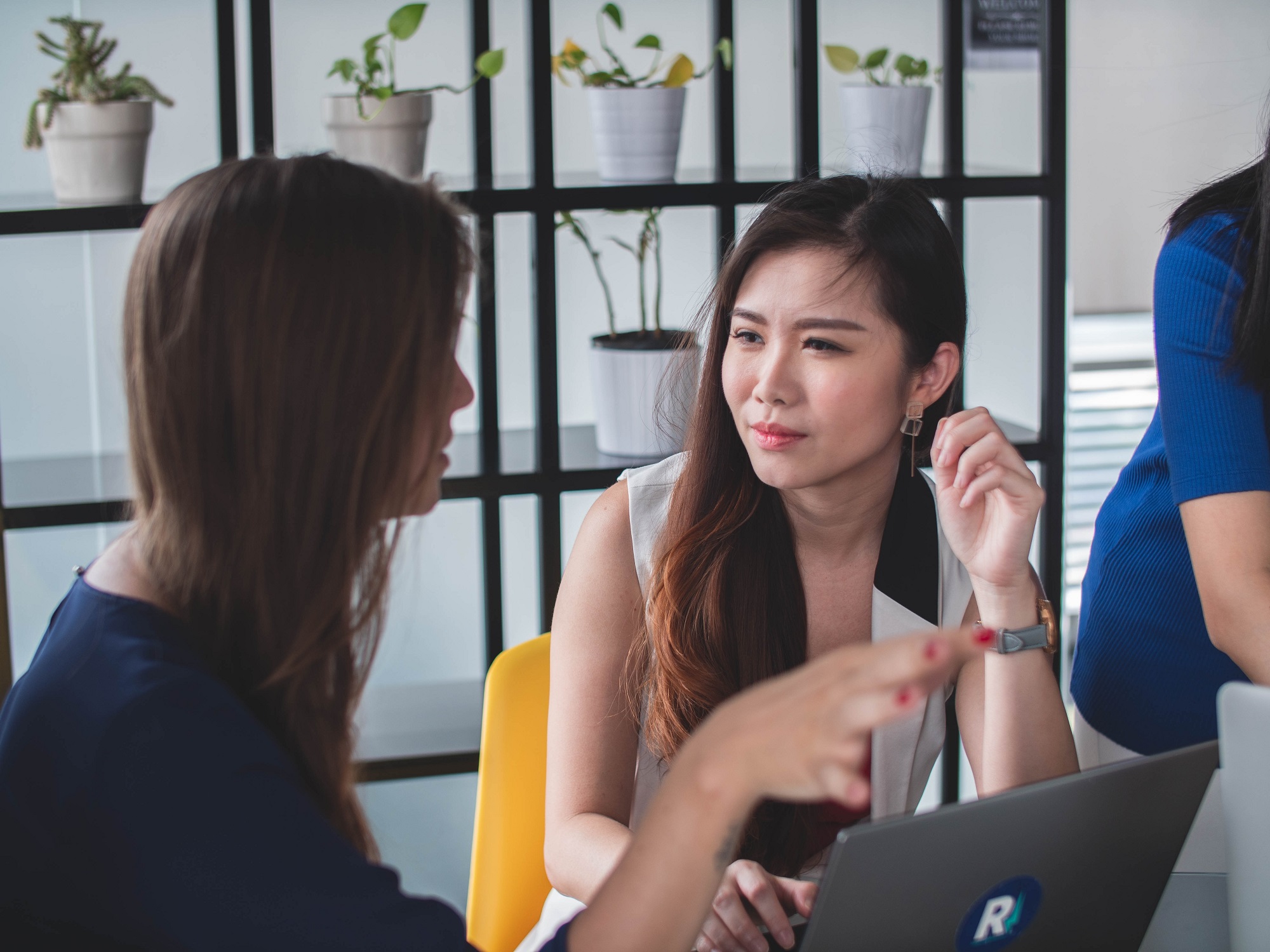 Women discussing at work