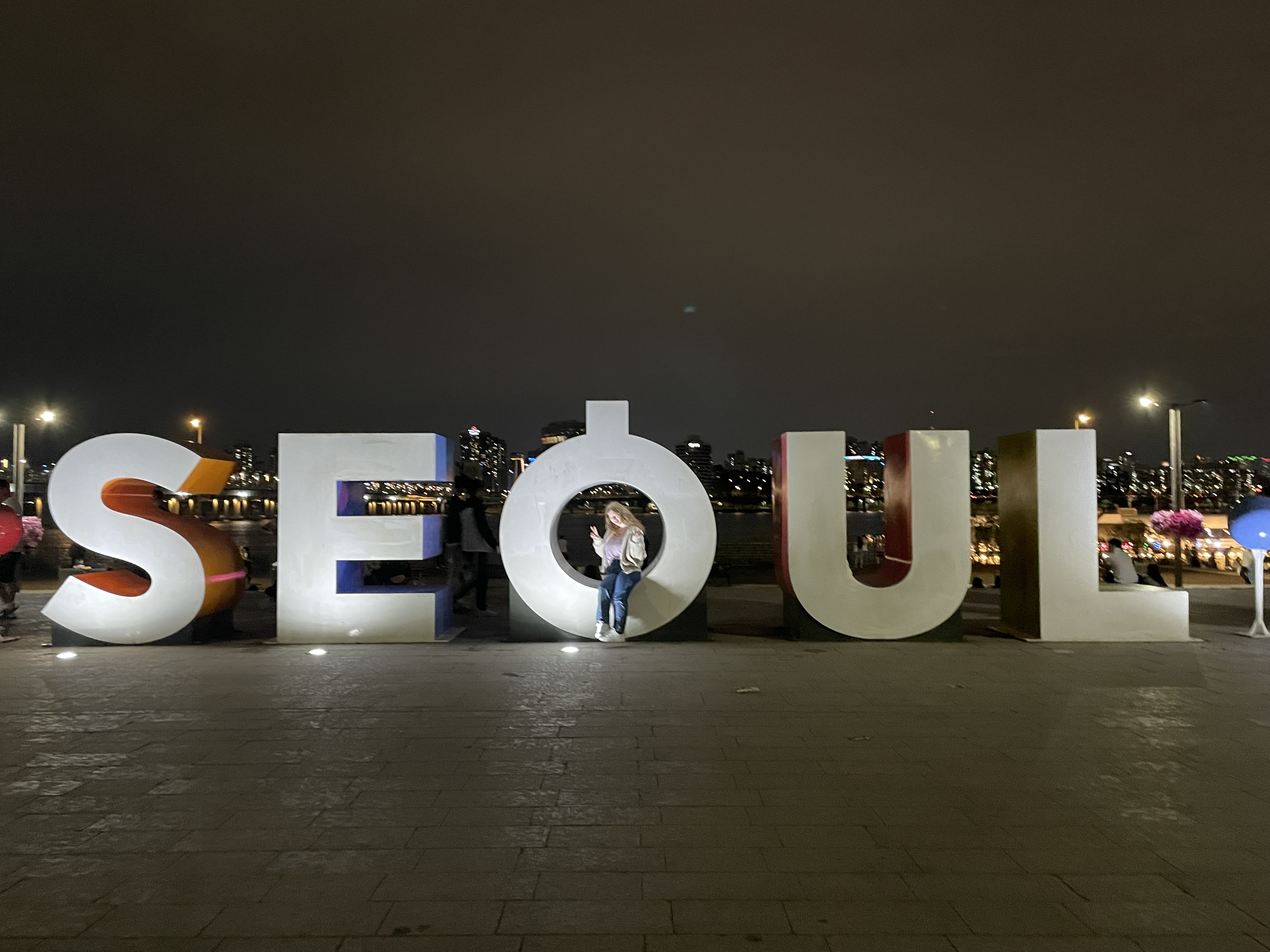 Sinead on an old temple trail by the Dongdaemun Design Plaza, note the temple against the background of the city!